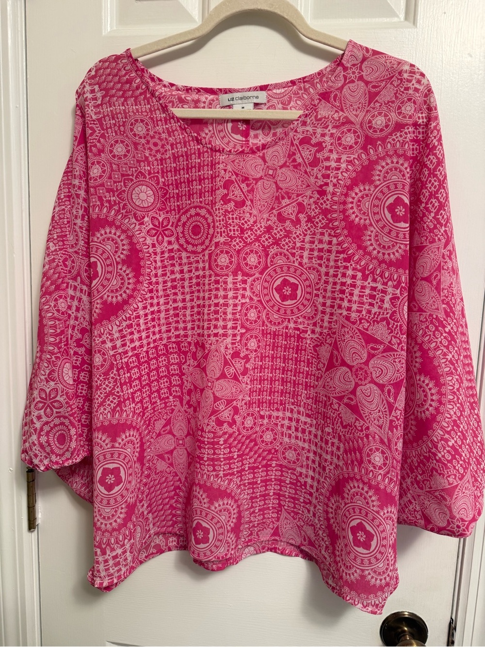 Poncho type blouse with sleeves